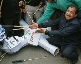 Members of the Amritsar Stationery Traders Association protest against the levying of VAT on Friday