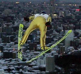 Austria's Thomas Morgenstern soars over the Japanese city of Sapporo while training for the FIS World Cup ski championship 