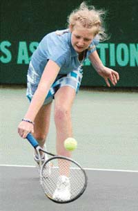Iryna Khatsko of Ukraine returns a shot to Sweta Solanki of India during a qualifying match of the ITF Junior Tennis Tournament at the CLTA Stadium in Chandigarh on Sunday. Iryna won 7-6, 6-1. 