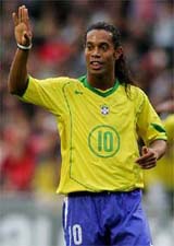 Brazil's Ronaldinho Gaucho, World Player of the Year 2004, waves to his team-mates during the first half of their Lunar New Year friendly match against Hong Kong