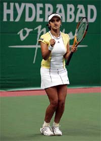 India's Sania Mirza celebrating the win against Jie Zheng of China