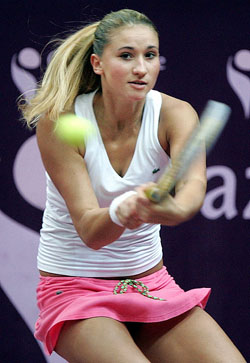 Tatiana Golovin of France returns a backhand