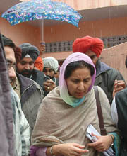 Ms Preneet Kaur, MP, wife of Capt Amarinder Singh, Chief Minister of Punjab, campaigns in rain for the Congress candidate from Ajnala