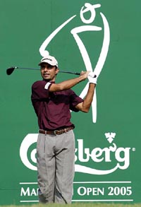 Jyoti Randhawa tees off during the third round of the Carlsberg Malaysian Open at the Saujana Golf and Country Club, Subang, Malaysia
