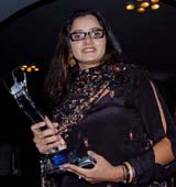 Tennis sensation Sania Mirza holds the Young Achiever Award at the second Women�s Awards at Siri Fort auditorium in New Delhi on Friday night