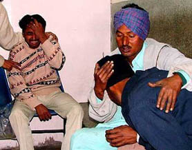 The inconsolable brothers of Rani, who died when the bus in which she was travelling overturned on the Bathinda-Goniana road on Monday.