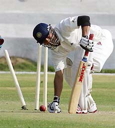 West Zone skipper Sachin Tendulkar seen clean bowled by Anil Kumble during the Duleep Trophy match against South Zone in Hyderabad