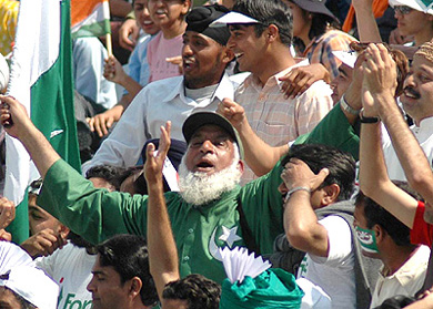 Pakistani supporter Sufi Ahmed Jalil, aka Chacha Cricket, cheers for his team