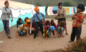 Students of Government Primary School, Tanda, Ropar, give a theatre presentation of a short story � Jhuthha Aajrdi� on a stage in the school on Wednesday.