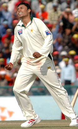 Danish Kaneria exults after snaring Sourav Ganguly during the third day�s play of the first Test in Mohali on Thursday