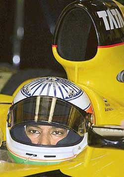 Jordan F1 driver Narain Karthikeyan of India gets ready for the Malaysian Grand Prix morning practice sessions at Malaysia�s Sepang International Circuit on Saturday