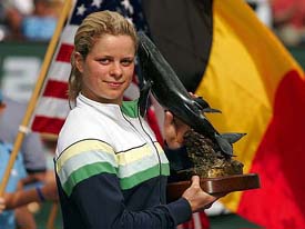 Kim Clijsters of Belgium poses with her trophy after defeating Lindsay Davenport of the US in the final of the Pacific Life Open in Indiana Wells on Saturday