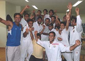 Punjab cricketers celebrate their victory over hosts Mumbai in the semifinal of the Ranji Trophy in Mumbai on Monday