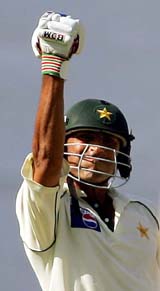 Younis Khan celebrates after scoring a century during the third Test between India and Pakistan in Bangalore on Thursday