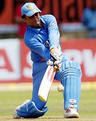 Virender Sehwag plays a shot during the first ODI match against Pakistan in Kochi on Saturday