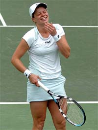 Kim Clijsters of Belgium rejoices after beating Maria Sharapova of Russia in the final of the Nasdaq-100 Open in Key Biscayne, Florida