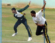 Pakistani bowlers Abdul Razzaq  and Danish Kaneria during a practice session on the eve of the second ODI against India in Visakhapatnam on Monday