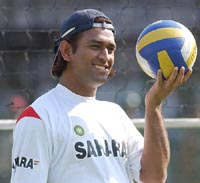 Indian wicketkeeper M S Dhoni with a volleyball during the practice session in Jamshedpur on Thursday