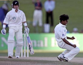 Sri Lanka's Lasith Malinga reacts after dismissing New Zealand's Hamish Marshall during the fourth day of the first Test in Napier