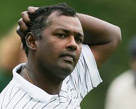 Vijay Singh reacts after his putt on the 14th hole during the second round play of the US Masters at the Augusta National Golf Club in Augusta