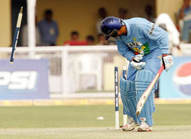 Virender Sehwag looks back after he is clean bowled during the fifth one-day international between India and Pakistan in Kanpur on Friday