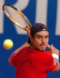 Richard Gasquet of France returns a backhand to Roger Federer of Switzerland during their quarterfinal match of the Monte Carlo Masters in Monaco on Friday