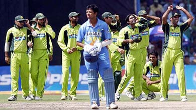 Pakistan cricketers celebrate the dismissal of Indian skipper Rahul Dravid during the final ODI match