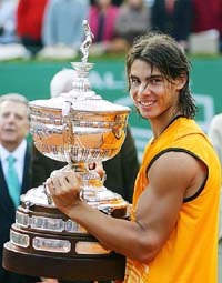 Rafael Nadal of Spain lifts the trophy after winning the Barcelona Open in Barcelona on Sunday