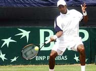 Prakash Amritraj returns the ball to Denis Istomin of Uzbekistan during their second singles match of the Davis Cup Asia-Oceania Group I second round tie in Jaipur on Friday