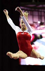 USA's Alicia Sacromone performs on the beam during the World Cup Gymnastics