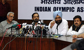 From left: BCCI president Ranbir Singh Mahindra, IOA president Suresh Kalmadi, secretary-general, IOA, Randhir Singh and Board vice-president Rajiv Shukla at a press conference in New Delhi on Thursday