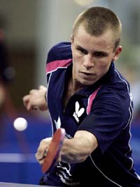Michael Maze of Denmark in action against Hao Shuai of China during their men's single quarterfinal match at the 48th World Table Tennis Championships in Shanghai, China