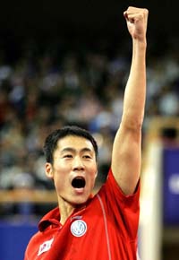 China�s Wang Liqin rejoices after winning the men�s singles final at the 48th World Table Tennis Championships in Shanghai
