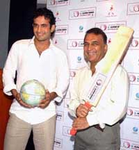 Sunil Gavaskar, president of the ICC selection committee for the World XI Super Series squads, with Irfan Pathan during the announcement of lists of probables in Mumbai on Monday
