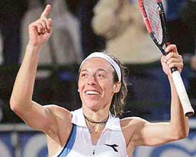 Italy�s Francesca Schiavone rejoices after defeating Serena Williams of the USA during the Italian Open women�s tennis tournament at Rome�s Foro Italico on Wednesday. Schiavone won 7-6 (2), 6-1