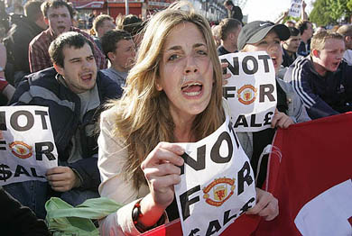 Supporters protest outside of Manchester United's Old Trafford stadium