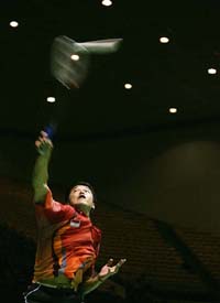 Taufiq Hidayat of Indonesia plays a shot during his men�s singles match against Peter Gade of Denmark in the semifinals of the Sudirman Cup in Beijing
