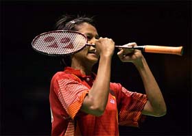 Fransisca Hari of Indonesia celebrates after winning her women�s singles match against Camilla Sorenson of Denmark in the semifinals of the Sudirman Cup in Beijing