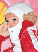 Brazilian Formula One driver Rubens Barrichello of Ferrari prepares for the first practice session of the Monaco Grand Prix on Thursday