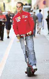 German Formula One driver Michael Schumacher of Ferrari arrives at the Monte Carlo track for the first training session of the Monaco Grand Prix