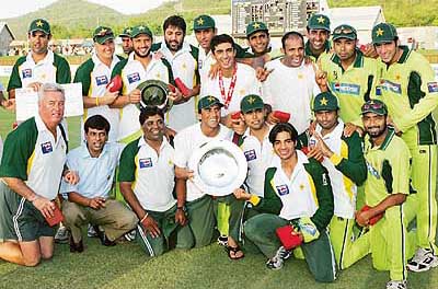 Members of the Pakistan cricket team with the trophy after beating the West Indies in the third one-day international in Gros Islet, St Lucia, on Sunday