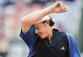 Third seed Marat Safin of Russia grimaces during his match against Raemon Sluiter of the Netherlands 