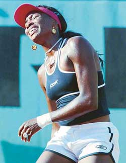 Venus Williams of the USA reacts during her third round match against Bulgaria�s Sesil Karatantcheva in Paris on Friday