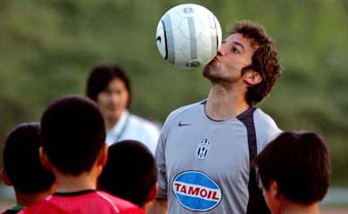 Italian Serie A champion team Juventus' star Alessandro Del Piero kisses the ball while showing a move