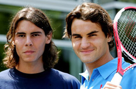 Roger Federer of Switzerland and Rafael Nadal of Spain look on during a photo call at Roland Garros