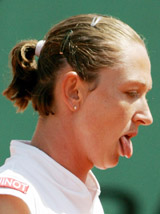 Elena Likhovtseva of Russia reacts during her semifinal match against Mary Pierce of France in the French Open at Roland Garros on Thursday