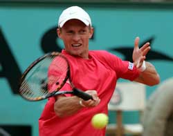 Russia�s Nikolay Davydenko plays a shot to Argentina�s Mariano Puerta during their semifinal at the French Open in Paris