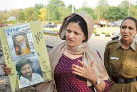 Mrs Poonam Singh, editor of Preetlari, protesting in Chandigarh on Saturday against the SGPC’s decision to build a memorial