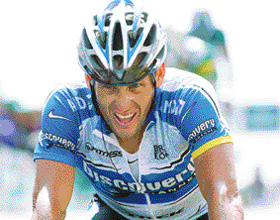 Lance Armstrong of the USA crosses the finish line at the fourth stage of the 57th Dauphine Libere cycling race in France on Thursday