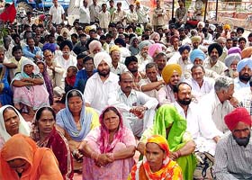 Supporters of the CPI and the CPM attend a rally in Rajpura
